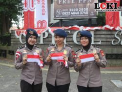 Brimob Metro Jaya Bagikan 5.000 Bendera Merah Putih kepada Warga Jakarta Jelang Hari Kemerdekaan RI